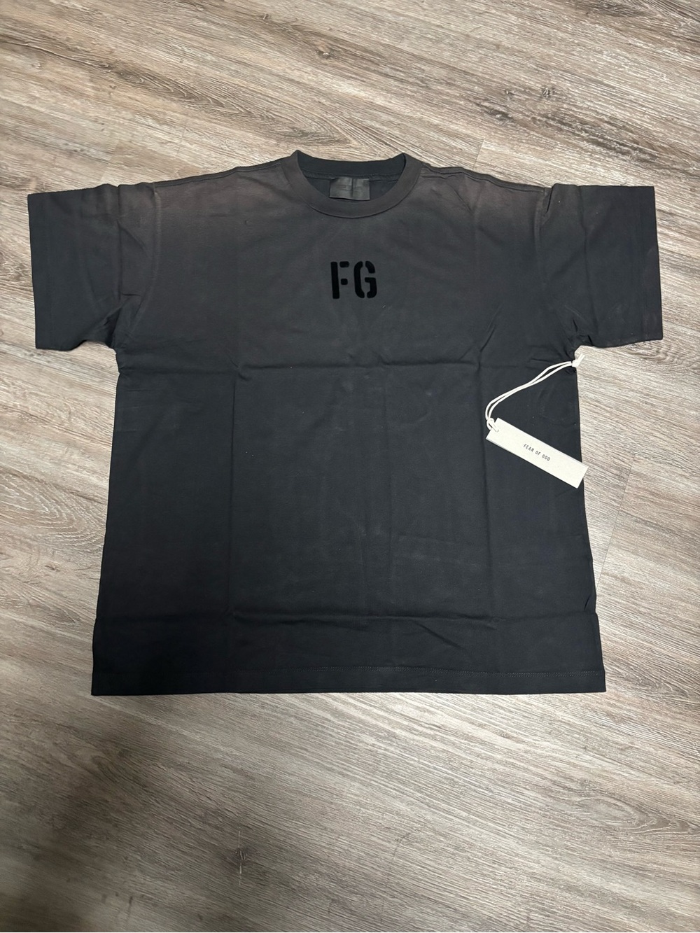 fear of god essentials vintage black tee